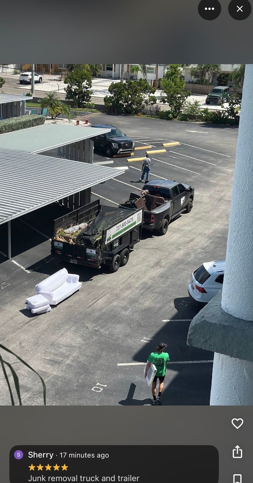 Customer project view of a No More Junk trailer clearing furniture from an apartment property in Clearwater, FL 33756