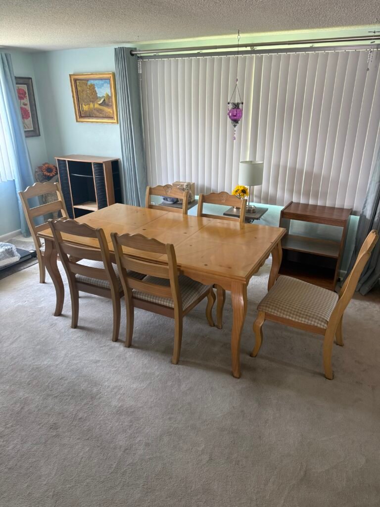 No More Junk providing residential furniture removal services in New Port Richey, FL during a dining room cleanout.