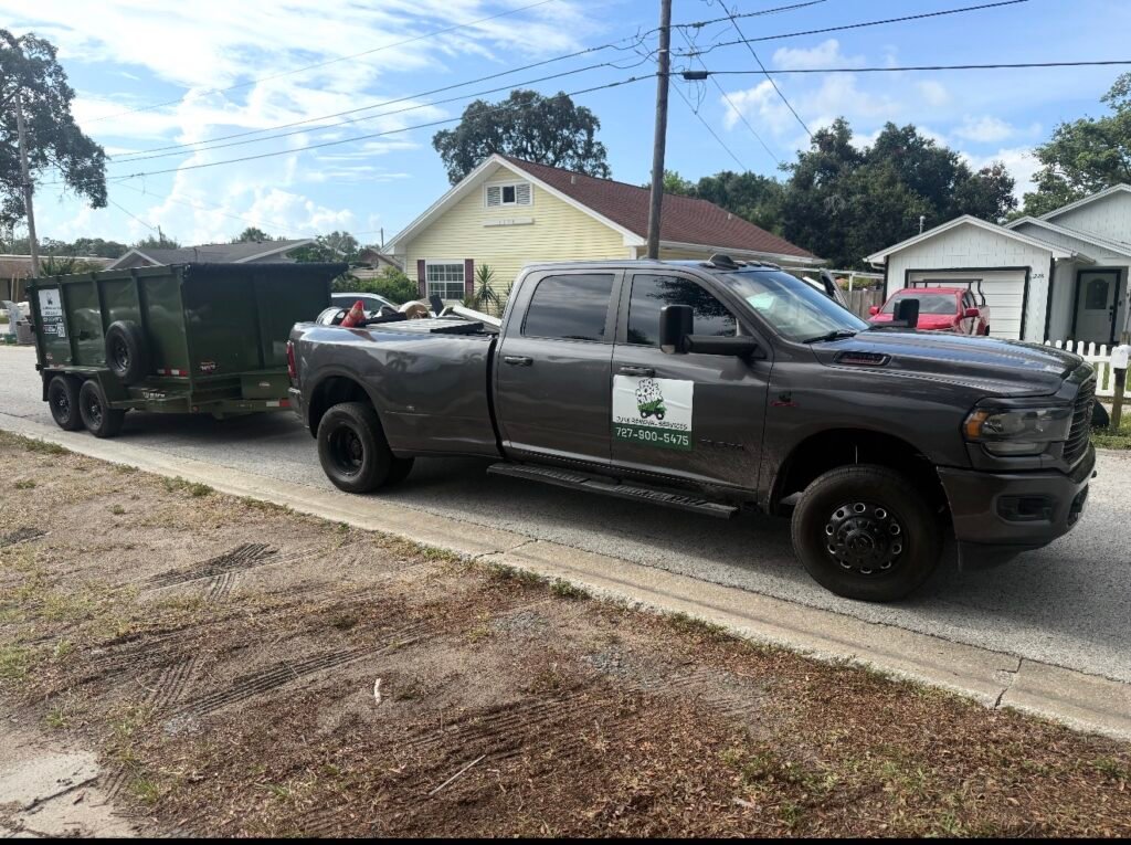 No More Junk branded junk removal truck and dump trailer ready for service in Clearwater, FL.