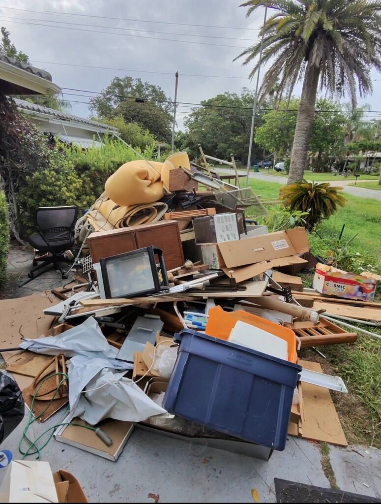 Large pile of junk removed from a hoarder house by No More Junk in Clearwater, FL, during a residential property cleanout.