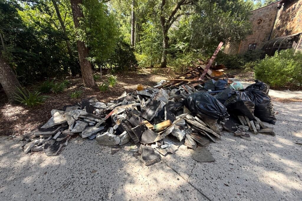 Construction and deconstruction debris removed by No More Junk during a property cleanup in Clearwater, FL.
